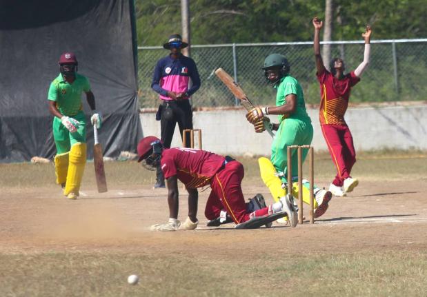 St Catherine CA bowler Ranjay Thomas throws his hands in the air as the ball evades wicketkeeper Amanjah Morris during the JCA Super 50 Cup match at Port Esquivel at the weekend. Also watching the action are Clarendon CA batsmen Teino Osbourne and Justin