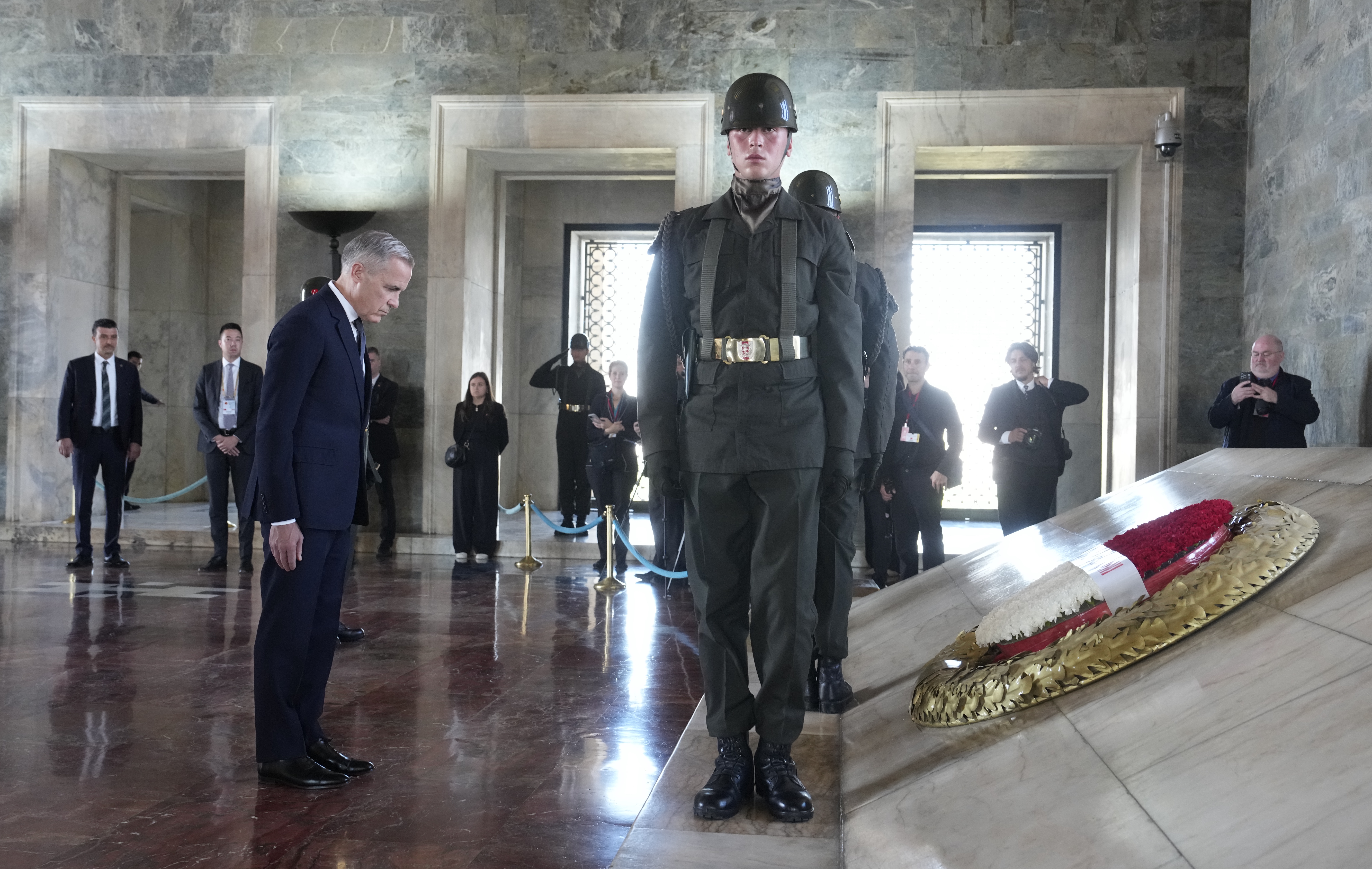 Prime Minister Mark Carney pays his respects after laying a wreath during a ceremony at the Anıtkabir, the Mausoleum of Mustafa Kemal Ataturk in Ankara, Turkey, Thursday, Oct. 22, 2026. THE CANADIAN PRESS/Adrian Wyld