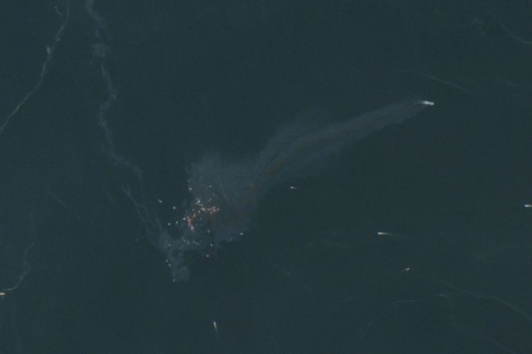 A satellite image shows containers and items floating in the water after a vessel sank near the Strait of Hormuz, off the coast of Oman, October 14, 2026. European Union/Copernicus Sentinel-2/Handout via REUTERS THIS IMAGE HAS BEEN SUPPLIED BY A THIRD PARTY. MANDATORY CREDIT. REFILE - CORRECTING FROM "SINGAPORE-FLAGGED GFS PRIDE" TO "A VESSEL" AND REMOVING "AFTER BEING HIT BY A PROJECTILE".