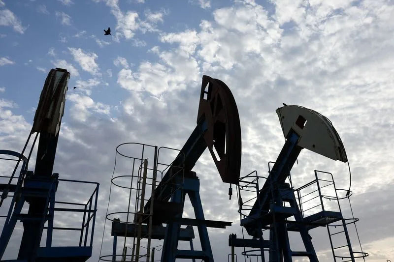 Asian stocks skid, Wall Street and bonds aided by oil slip